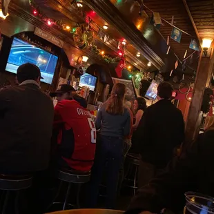 people sitting at the bar