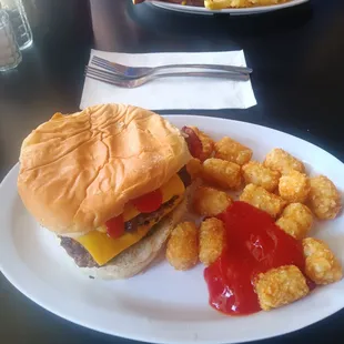 Double bacon cheeseburger with tots