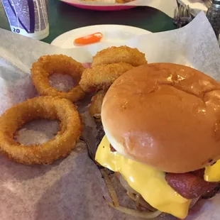 Bacon cheese burger, onion rings, fish and chips