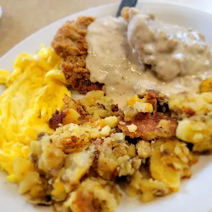 Chicken fried steak with hashbrowns and eggs