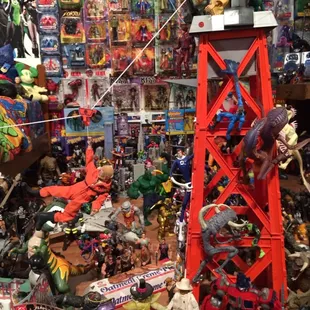 Bedroom of an adult action figure collector.