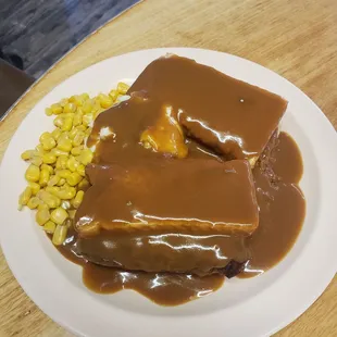 Hot shot Swiss steak with mash potatoes and corn.  YUMMY!