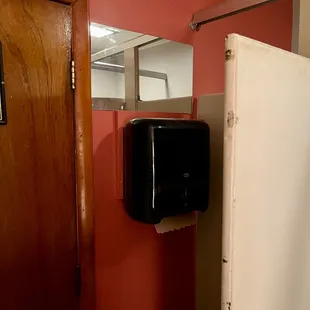 What's up with a mirror only people 6' tall can see?