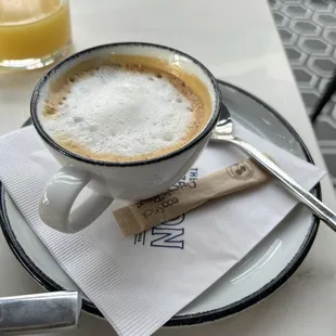 Eggs Benedict and espresso macchiato.