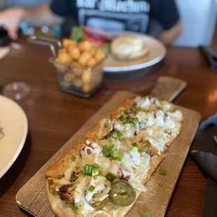 a man sitting at a table with food