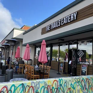 3/20/2021 Outdoor dining with cute graffiti heart barricades. Indoor dining is now available