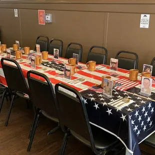 Tribute table to honor the 13 military service personnel who lost their lives during the recent Afghanistan evacuation.