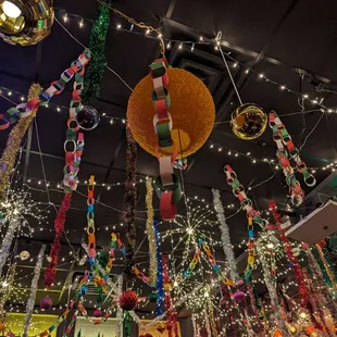 christmas decorations hanging from the ceiling