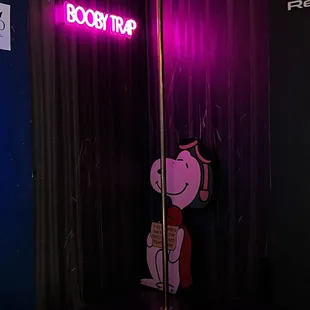 a cartoon character on a pole