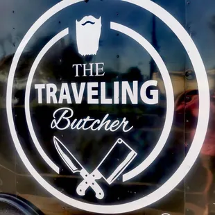 a woman standing in front of a food truck