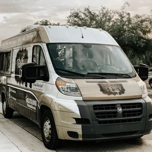 a coffee van parked on the side of the road