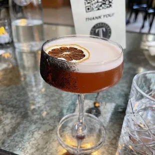 a cocktail in a coupe glass