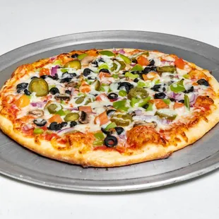 a pizza with olives, peppers, and cheese
