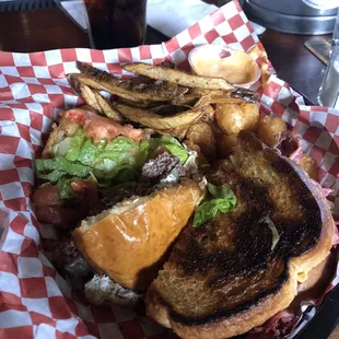 My plate is a combo of half a rueben and half a burger with tots and fries , me and my wife split our meals , both were very good