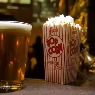 Draft beer and fresh popcorn.