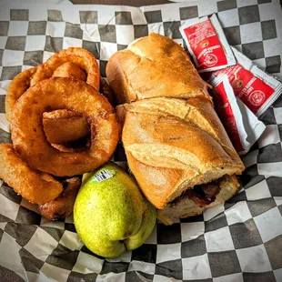 Classic Oak Tri-Tip and Onion rings. Pear not ripe but a nice touch.