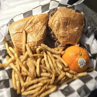 Tri tip fries and fresh fruit.