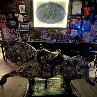 a carousel horse in a bar