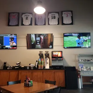 a table and televisions