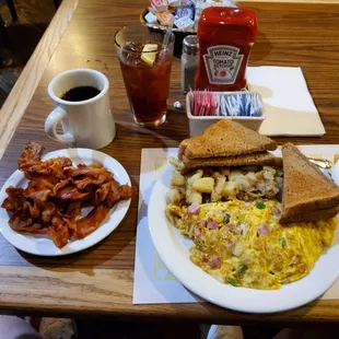 Western omelet with side of bacon.