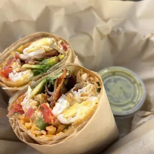 Scrambled egg burrito with pico de gallo, cheddar cheese, avocado. and the sauce was delicious cilantro avocado