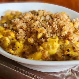 Baked sausage, egg, and cheddar mornay sauce scramble.
