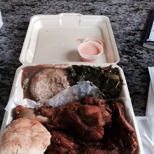 Drum stick, a flat, cornbread and gravy, and collard greens!  In 91' heat. I'm in love. It's all delicious. Soft bun too.