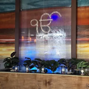 Peaceful waterfall inside.