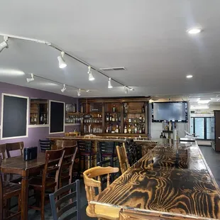 a bar with several chairs