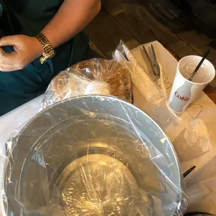 Crab legs and a bucket for remains