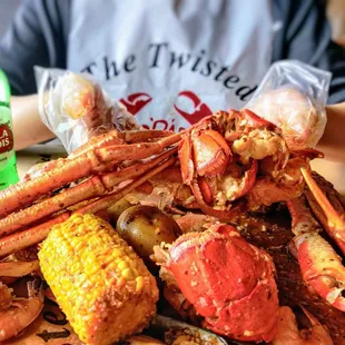 crab legs and corn on the cob