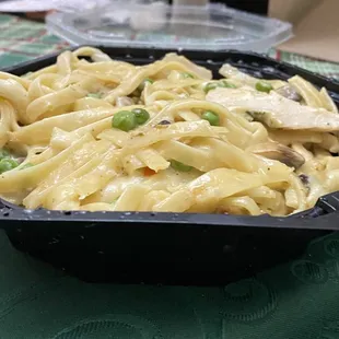 Fettuccine Alfredo with chicken. This small take out container is $16.90!