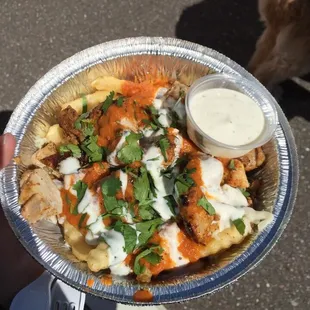 Chicken tikka yogi fries with extra sauce. Yum