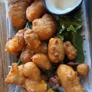 Best lightly breaded Gibbsville curds and friendly folks everywhere.... Very nice vibe on a cool little lake