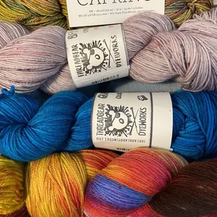 Sample of yarns we purchased. The shop brand are the two center skeins...Threadbear Dyeworks!