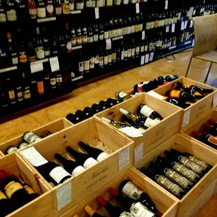 Shelves and cases of wine.
