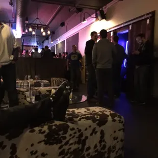 a group of people standing and sitting