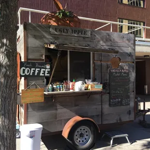 a coffee truck parked on the side of the road