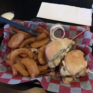 a sandwich and onion rings