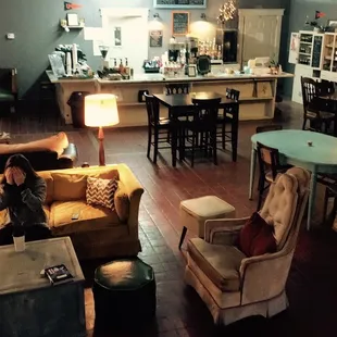 a woman sitting on a couch