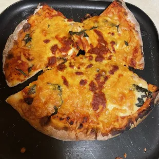 The pizza after I added the cheese and sauce to it so my son would eat it.