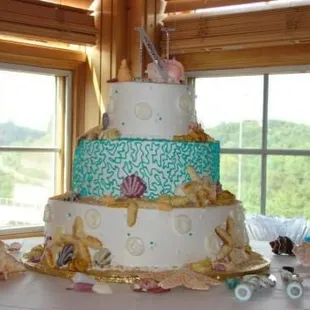 My beach theme wedding cake designed by ultimate pastry shop.  It was beautiful and delicious!!