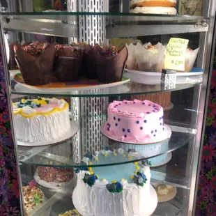 cakes and cupcakes. Love the pink frosting