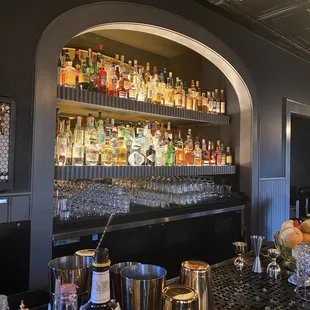 a bar filled with liquor bottles