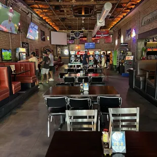 Big seating area with Arcade in the back and they got Shuffleboard!!!