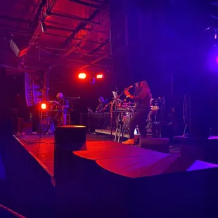 a band performing on stage at a concert