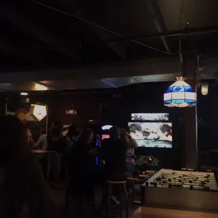 a group of people playing a video game