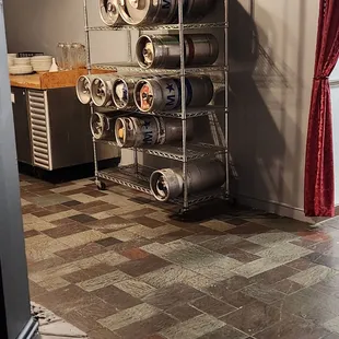 a rack of beer kegs