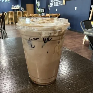 a cup of coffee on a table