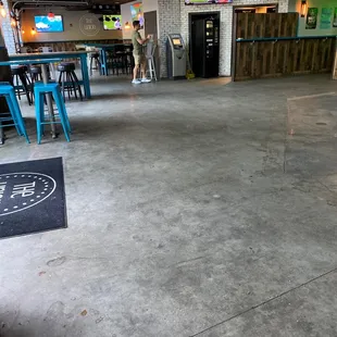 a restaurant with tables and chairs